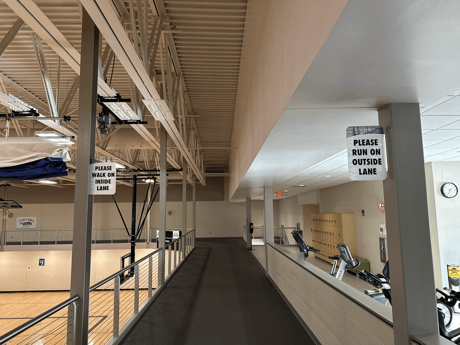 Custom indoor aluminum wayfinding signs for the indoor track at TRAC in Jamestown, ND.