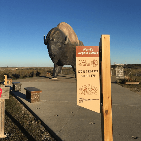 Custom sign indicating the 'World's Largest Buffalo' in Jamestown, North Dakota.