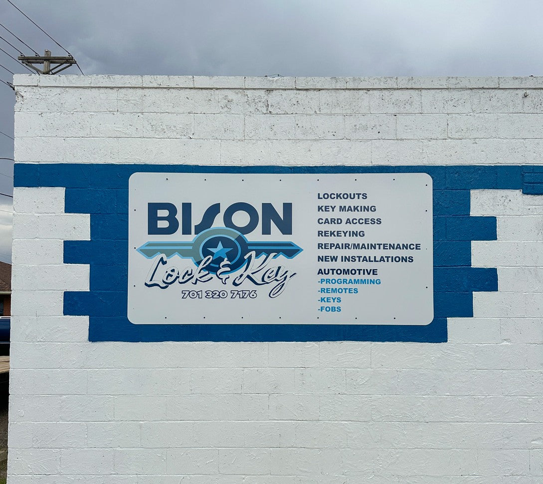 Custom exterior business sign for Bison Lock and Key building in Jamestown, ND.
