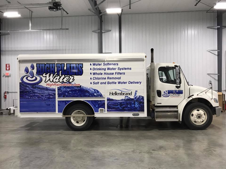 Custom vehicle decals on white truck for High Plain Water in Jamestown, ND.