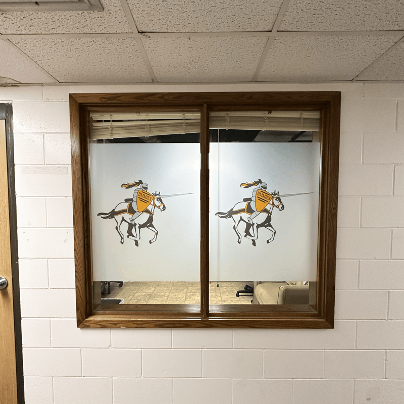 Custom frosted window film graphics and decals for University of Jamestown in Jamestown, ND.