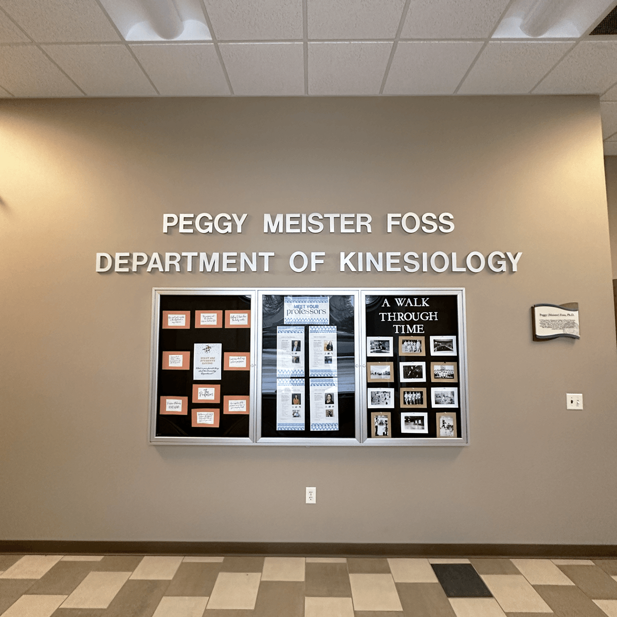 Wall with signage for Peggy Meister Foss Department of Kinesiology on University of Jamestown campus in Jamestown, ND.