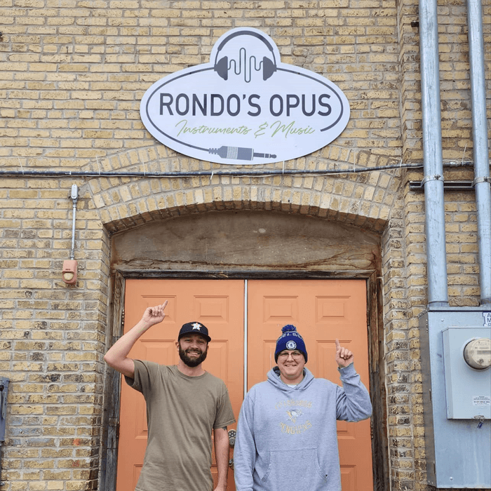 Custom direct print poly metal storefront sign for Rondo's Opus in Lisbon, ND.
