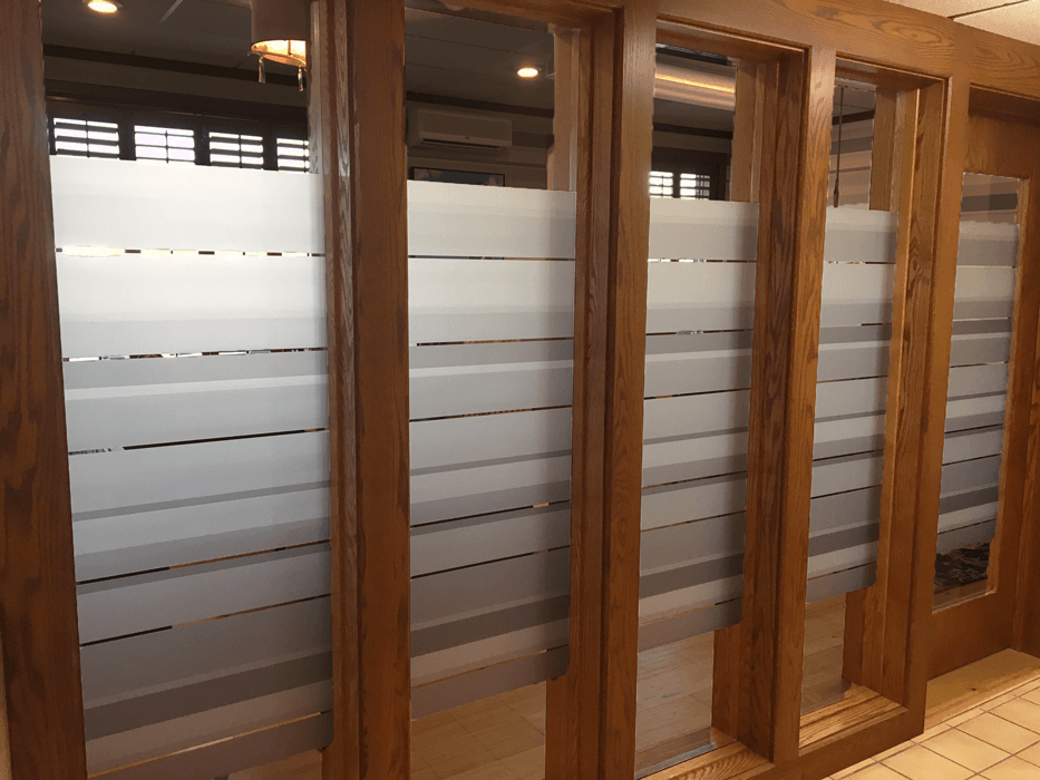 Custom frosted window film for office windows in Jamestown, ND.