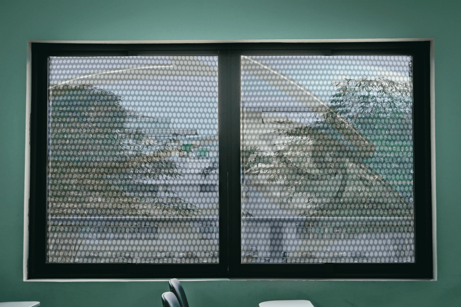 Custom perforated window film for school safety in Jamestown, ND.