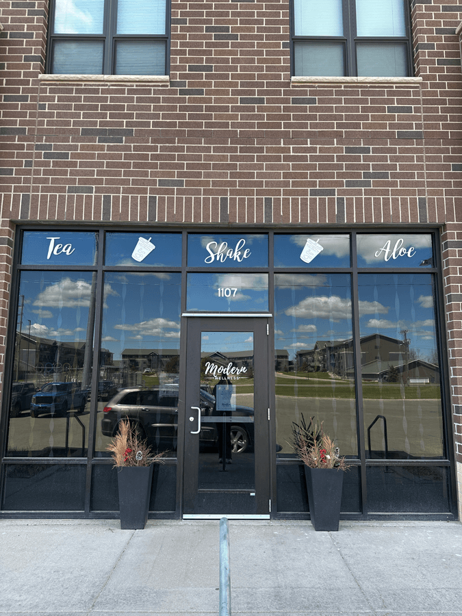 Modern Wellness Storefront with custom branded window decals and graphics in Jamestown, ND.