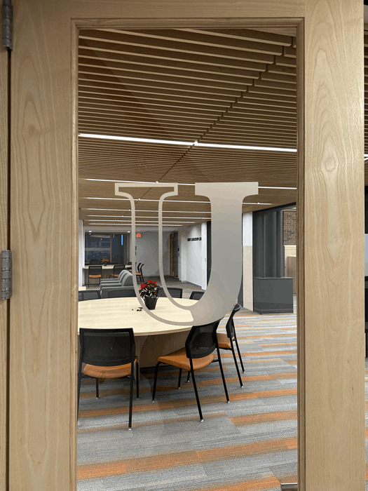 Custom frosted die-cut window graphics for university branding and decor in Jamestown, ND.